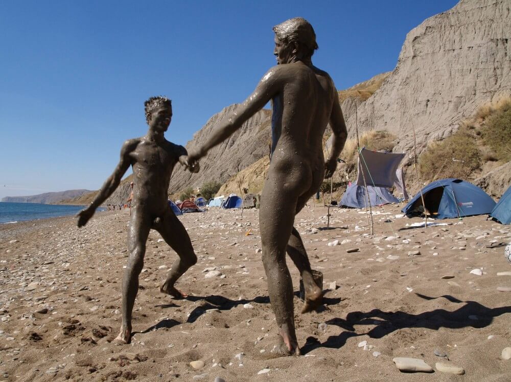 Jr Nudist Nude Beach Mud Soldiers photos - Naturists value a simple life