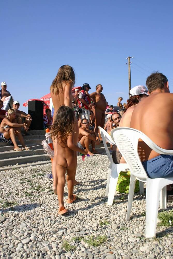 Naturist Standing Sideline - In ancient times, sports were practiced in the nude