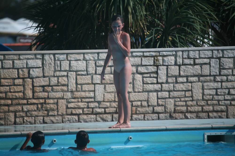 Naturist Pool-Side Singles photos - Living in harmony with nature is the primary goal of the naturist and nudist lifestyle