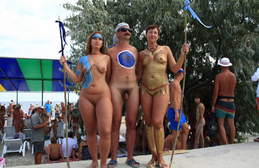 Three Painted Girl Poses pics - Nudist festivals are beautiful