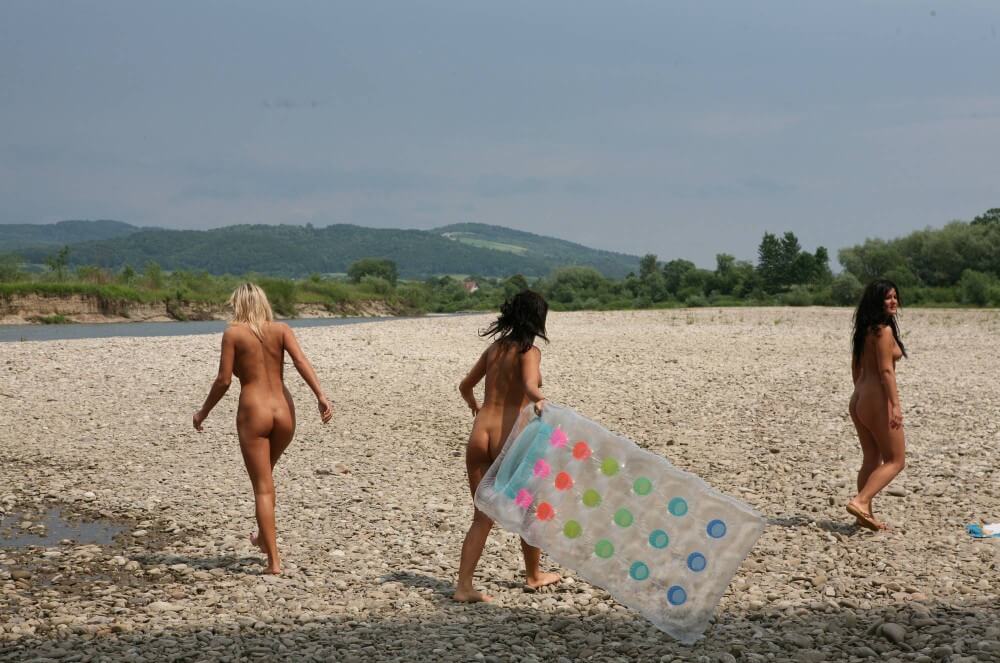 Naturist Park Floating On River photos - People who participate in nude recreation seek psychological comfort