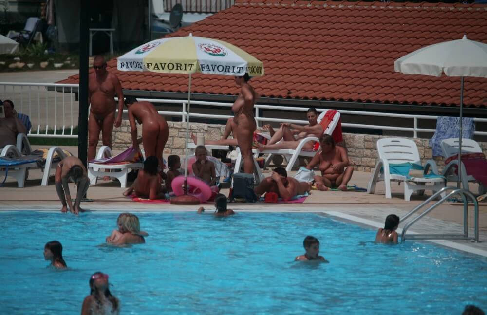 Naturist Pool Observation pics - A nude person strives for inner harmony and peace of mind
