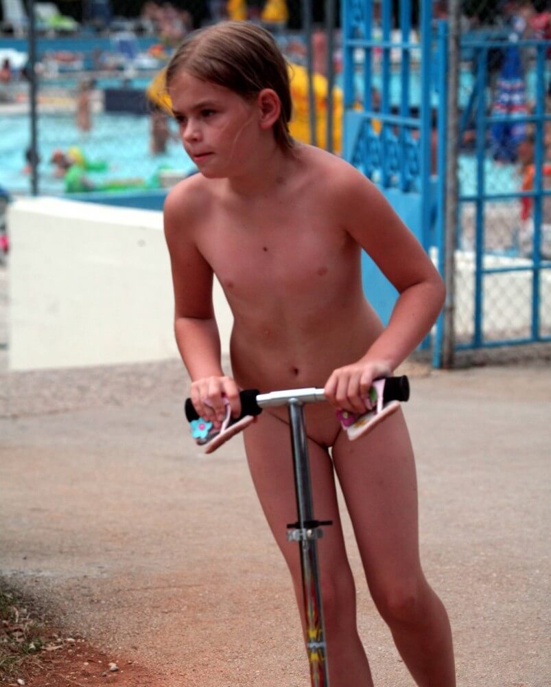 Pool-Side Naturist Scooter pics - The practice of naturism fosters inner harmony