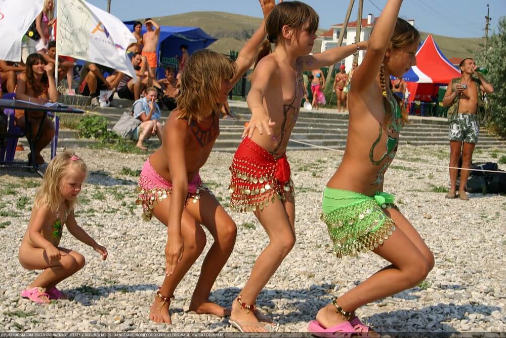 Festival and dancing photos - What Is Naturist Tourism and How Is It Evolving?