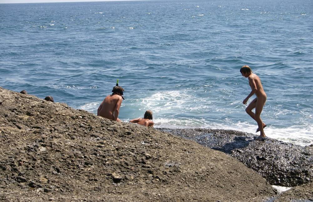 Leaning Against Hit Rocks pics - Lightness and ease as the main traits of naturists